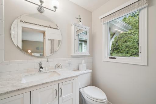 Renovated Primary Bathroom with Walk-in Tiled Shower