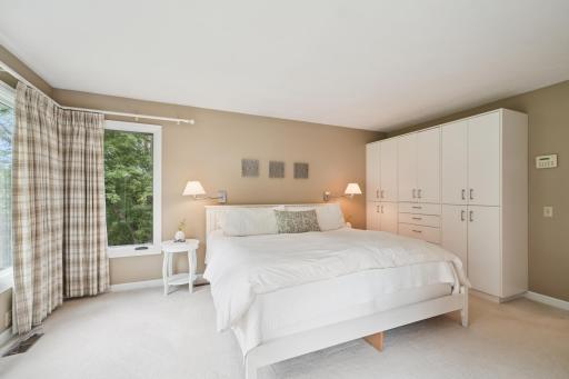Primary has Built-in Storage and His/Hers Closets