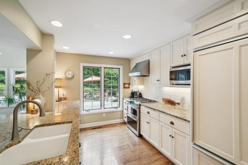 Gas Range / Vent and Built-in Fridge with Ample Counter Space