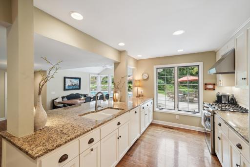 Gourmet Kitchen with Enamaled Cabinets and Granite Countertops