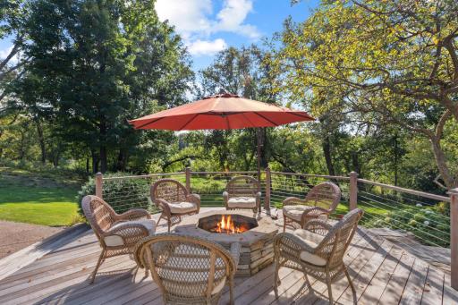 Outdoor Entertainment Space with Fire-pit and Surrounded by Nature