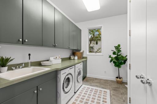 Countertops to be changed to a white Corian with a light, gentle vein of brown throughout