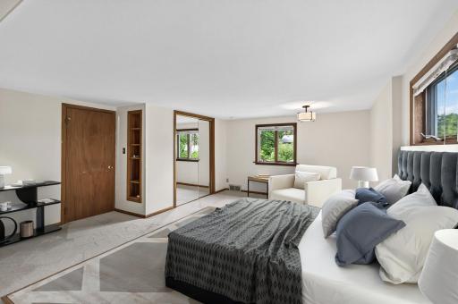 Upper level primary bedroom - virtually staged