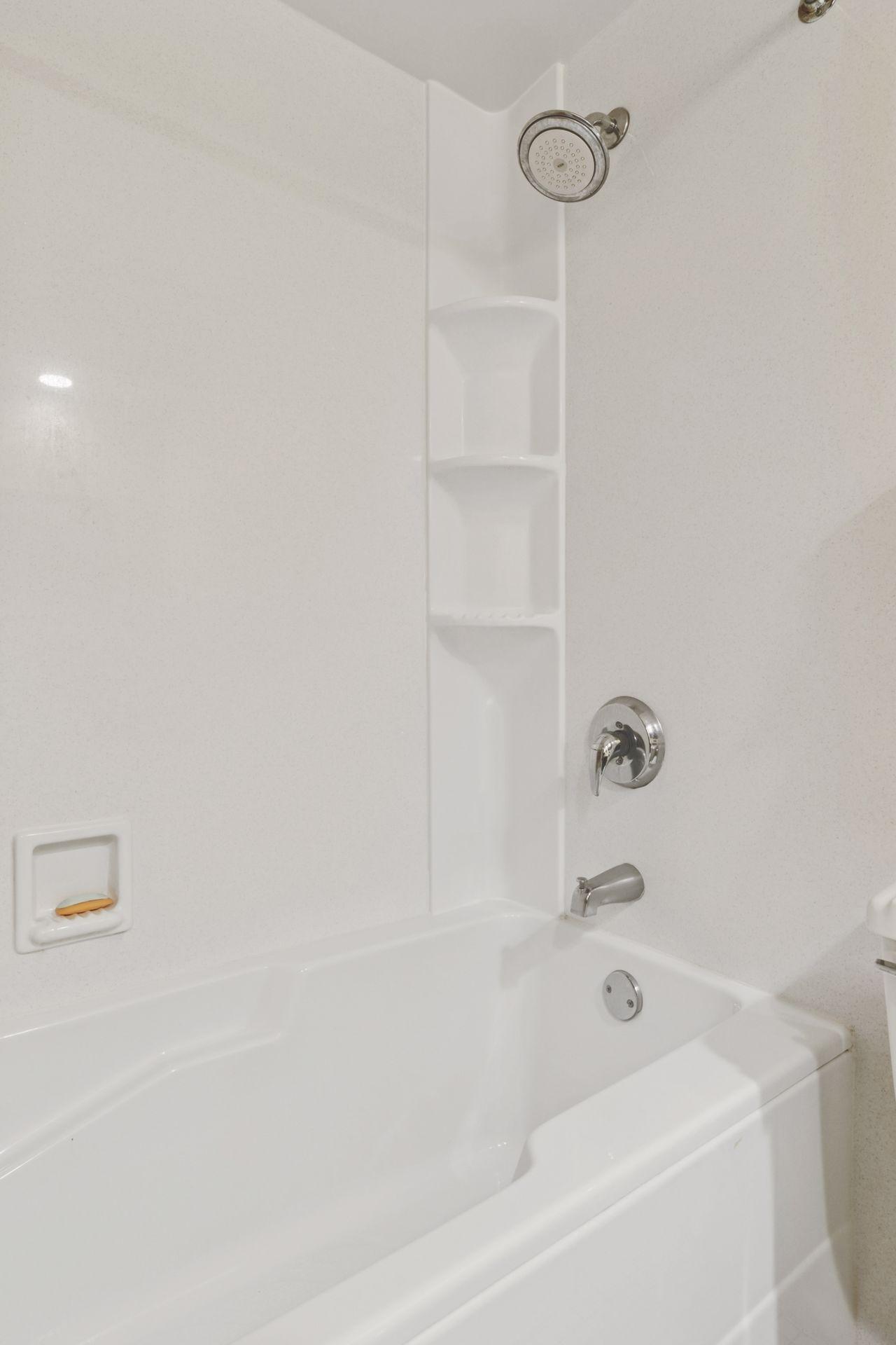 Soaking tub and updated fiberglass walls.
