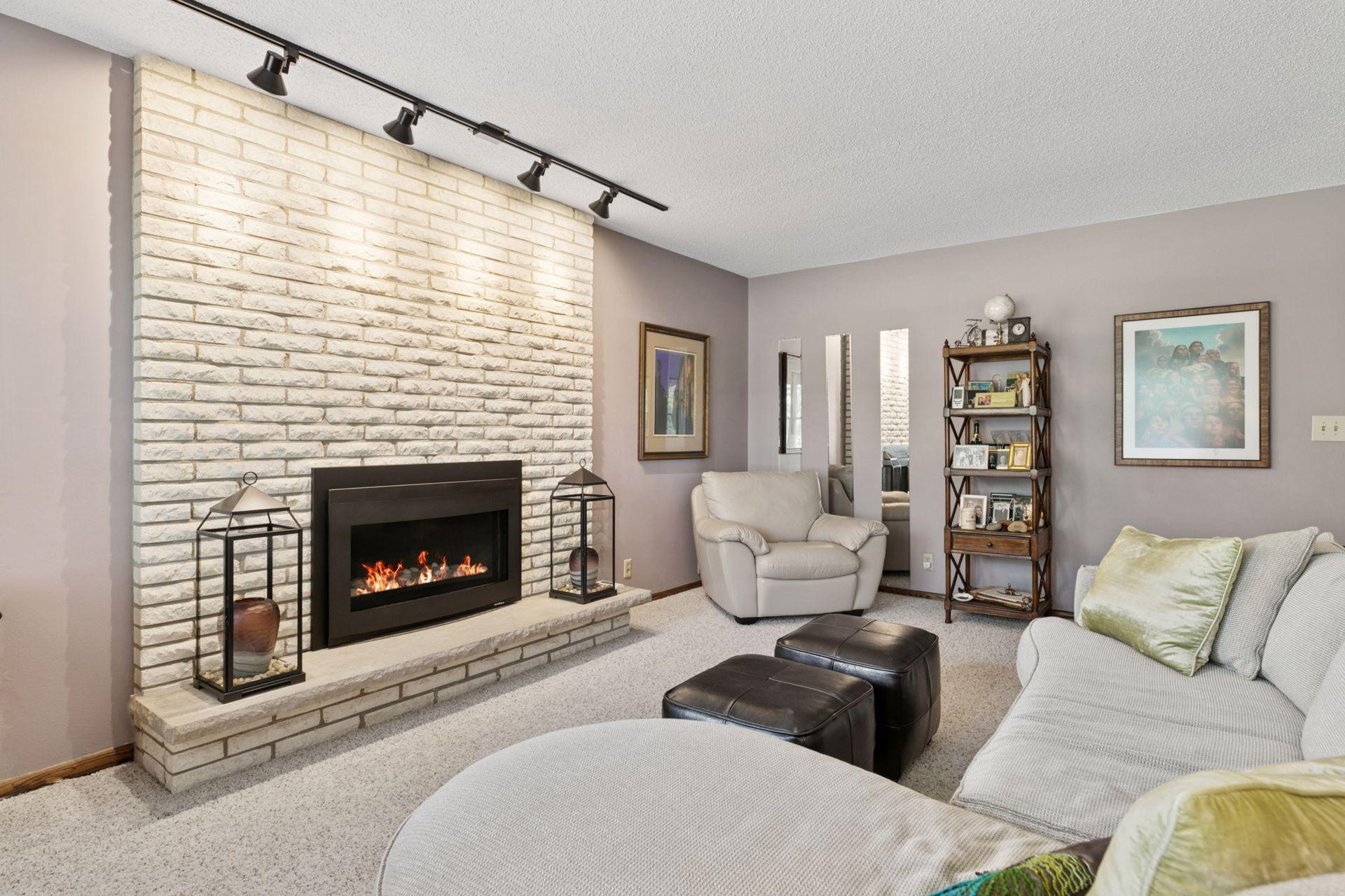 Accent lighting over fireplace.