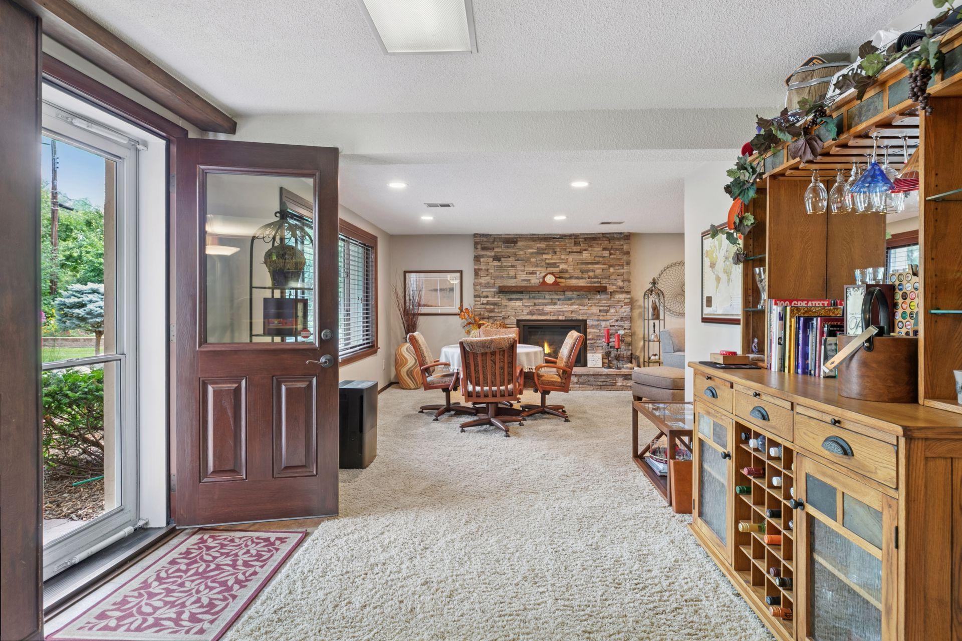 Door to patio and flat backyard.