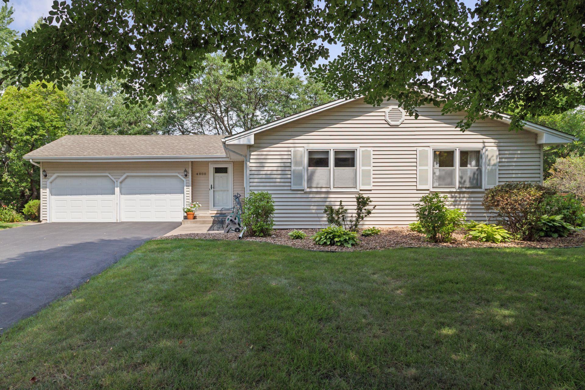 One story walk out with 3 bedrooms on main level, 2 baths, 2 car attached garage.
