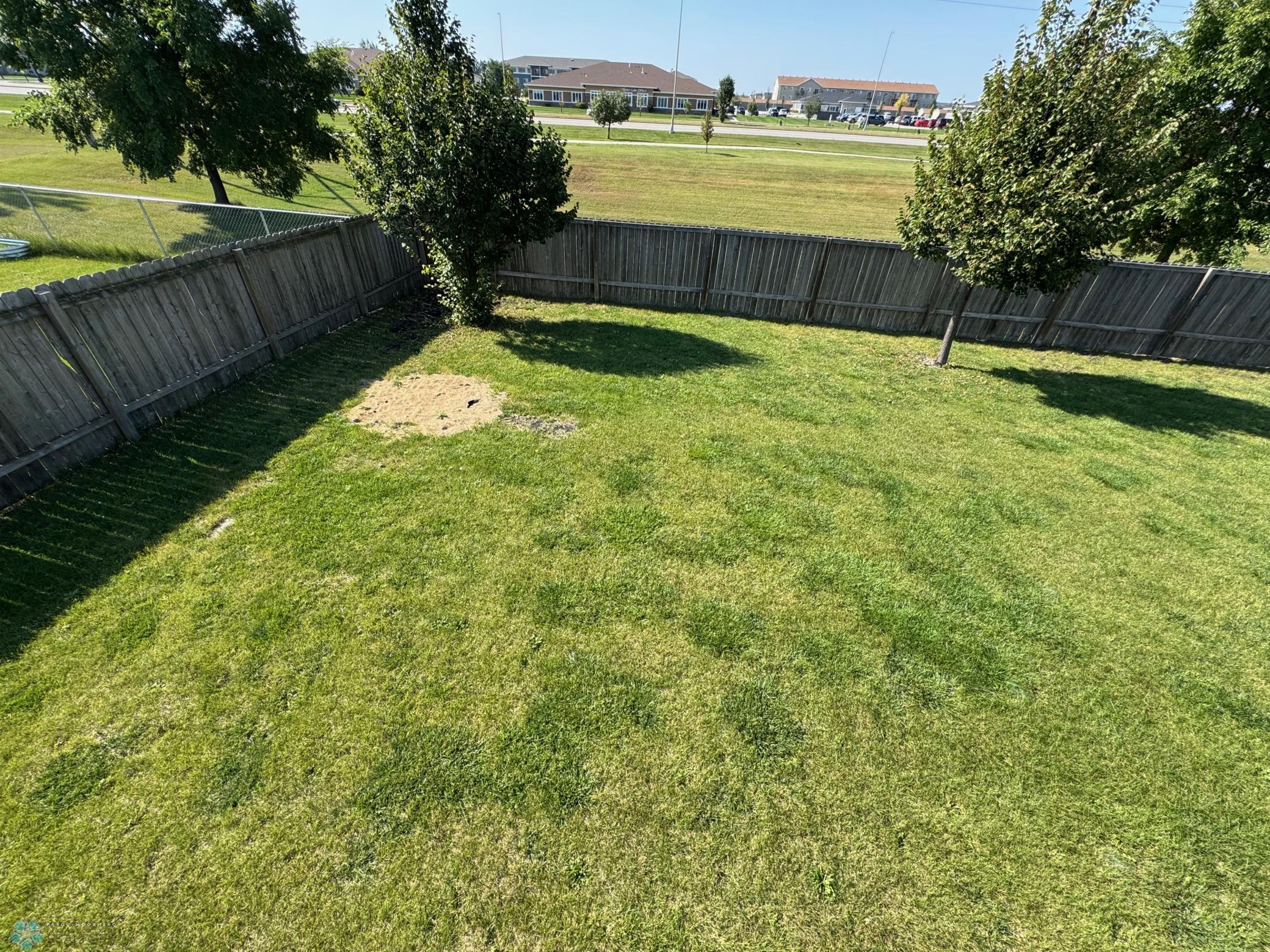 Fenced back yard.