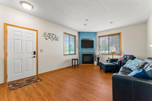The Large Living Room w/a Cozy Corner Fireplace