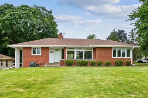 Mid century brick rambler on a corner lot
