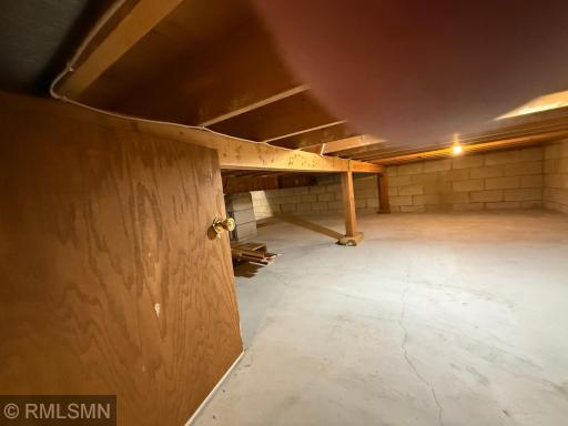 Very Large Storage area with a concrete floor.