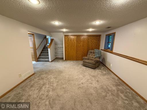 Huge closet to store your recreational items and access to crawl space.