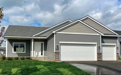 9770 32nd St NE- Home will be ready for closing on 9/10/25! Highlights include a Spacious Concrete Front Porch and Finished Walkout Lower Level. Sod, Irrigation System, and Front Yard Plantings included. Front door will be painted soon.