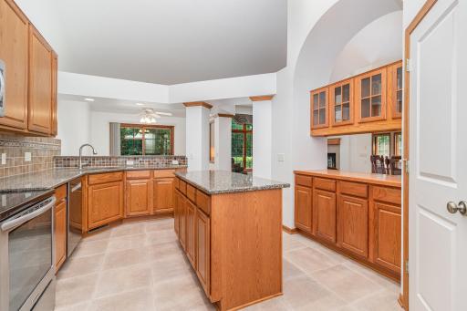 plenty of cabinets in a bright, convenient kitchen