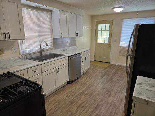 Nice windows and a half-lite door ensure you will have abundant natural lighting.