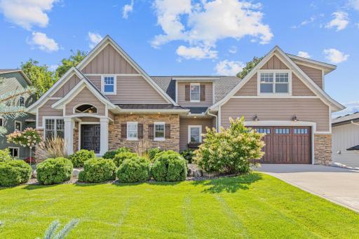 Curb appeal galore! With its storybook charm, manicured landscaping, and a setting that flows seamlessly to 90’ of pristine Turtle Lake shoreline, this home is breathtaking before you even step inside.
