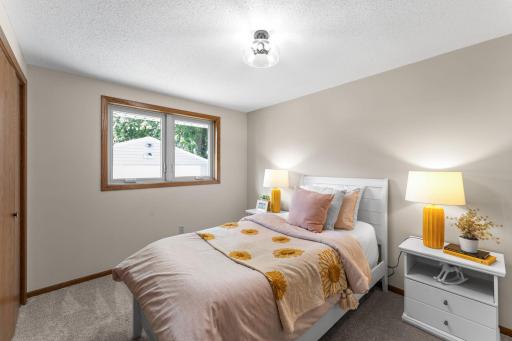 Pella windows throughout the home add energy efficiency, abundant natural light, and year-round comfort.