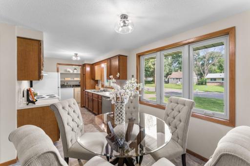 With room for daily meals or special occasions, this space serves as the heart of the home, connecting seamlessly to the kitchen.