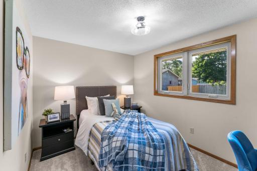 Each bedroom has plush new carpeting, ample closet space, and updated lighting.