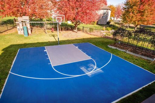 Photo for 1965 Fountain Lane, Waconia, MN 55387 - listing #6770317 Spacious, fenced-in backyard with 30x30 sport court and large deck — something you rarely get with new construction.