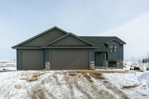 Photos are of a previously completed home with similar design and features. Actual selections, finishes, and materials may vary based on buyer choices and availability.