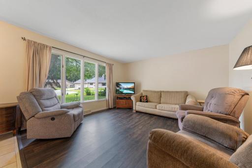 SUN FILLED LIVING ROOM OVERLOOKING FRONT YARD.jpg