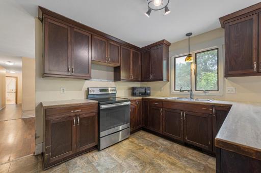 U-SHAPED KITCHEN LAYOUT FOR AMPLE COUNTER SPACE + STORAGE.jpg