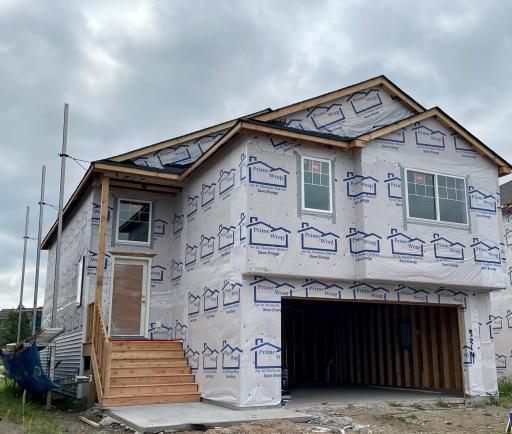 3214 Kady Ave NE- Photo of home progress offering an estimated October move-in! Siding install will be completed soon.