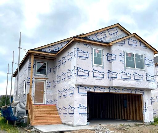 3214 Kady Ave NE- Photo of home progress offering an estimated October move-in! Siding install will be completed soon.