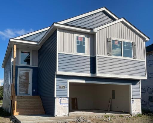 3214 Kady Ave NE- Photo of home progress offering an estimated October move-in. Home features a finished walkout lower level located on a Cul-De-Sac homesite!