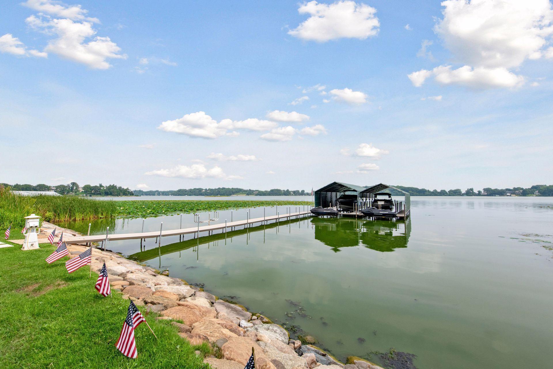 About 100 foot dock with 2 electronic boat lifts and 2 electronic jet ski lifts