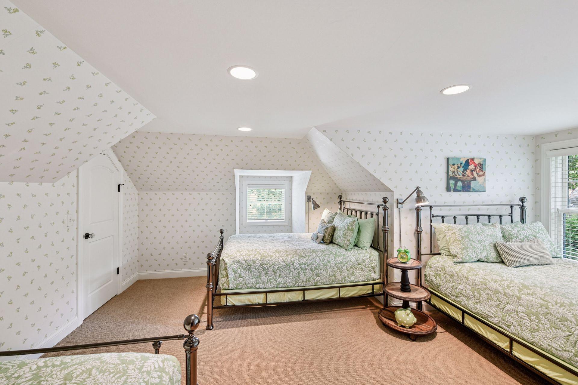 Third bedroom on the upper level with room for multiple beds