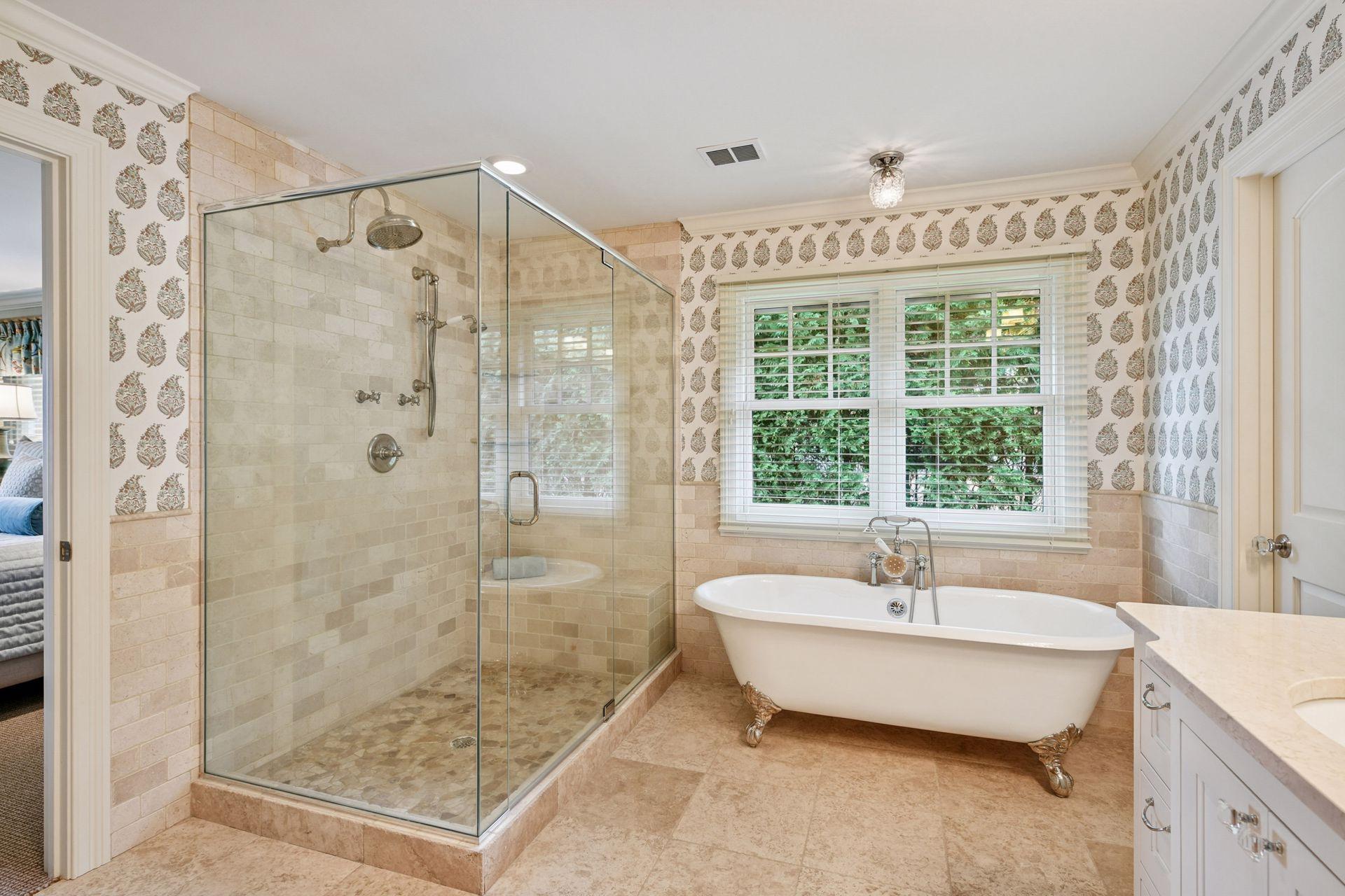 Primary bathroom tub and walk-in shower