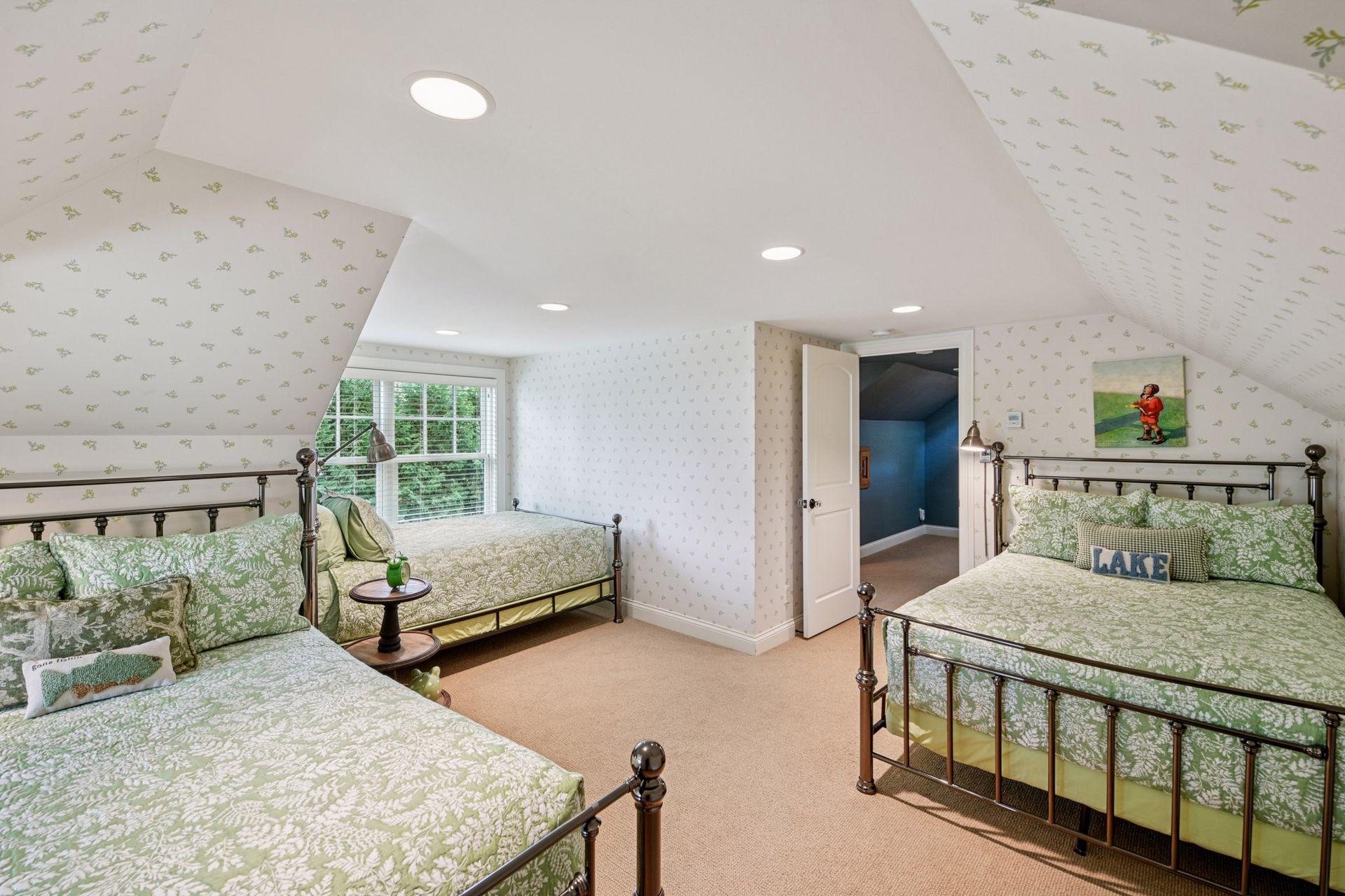 Third bedroom on the upper level with room for multiple beds