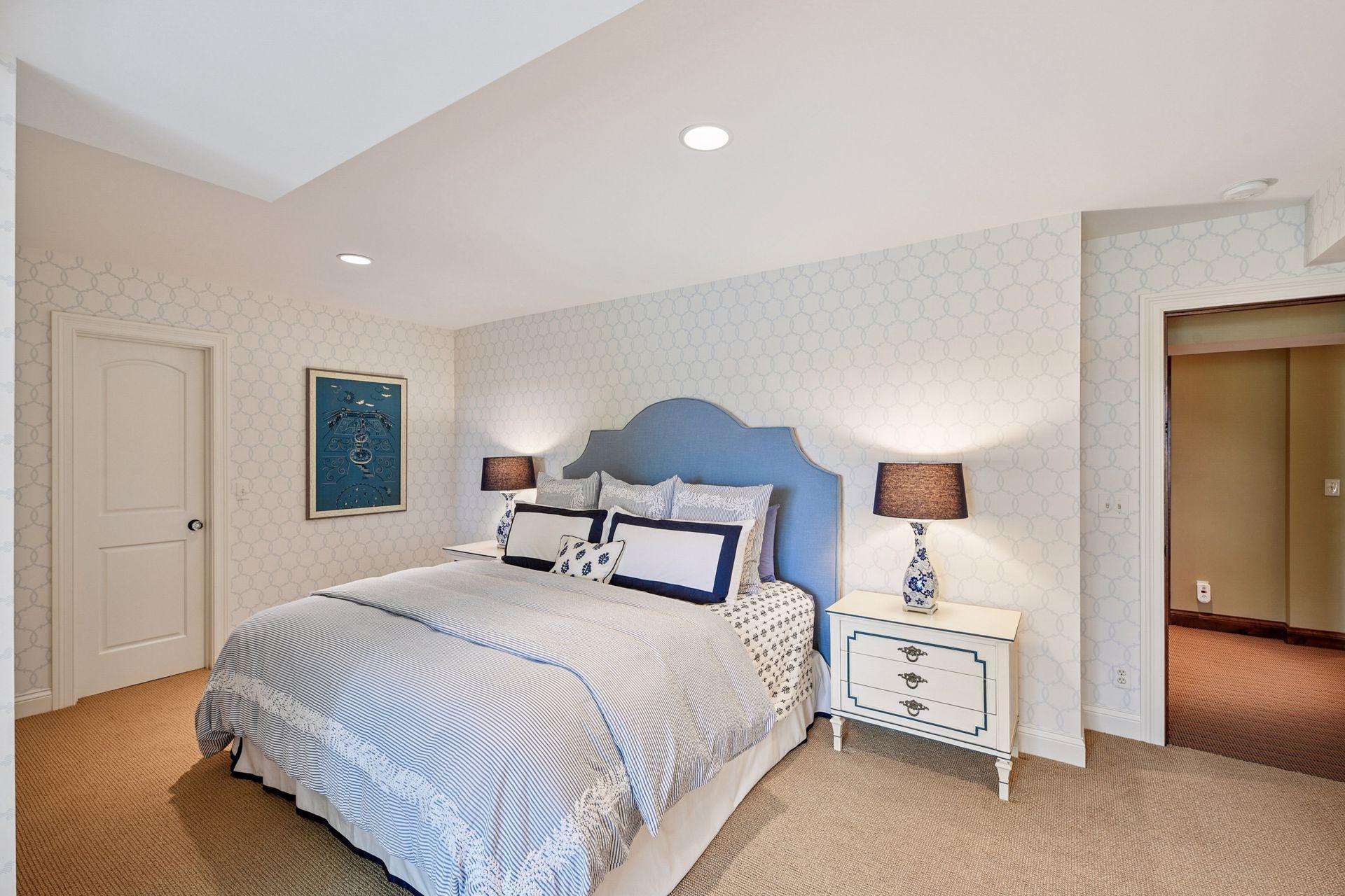 This bedroom has a walk-in closet and room for multiple beds