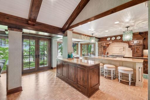 Additional center island offers generous prep space and abundant storage