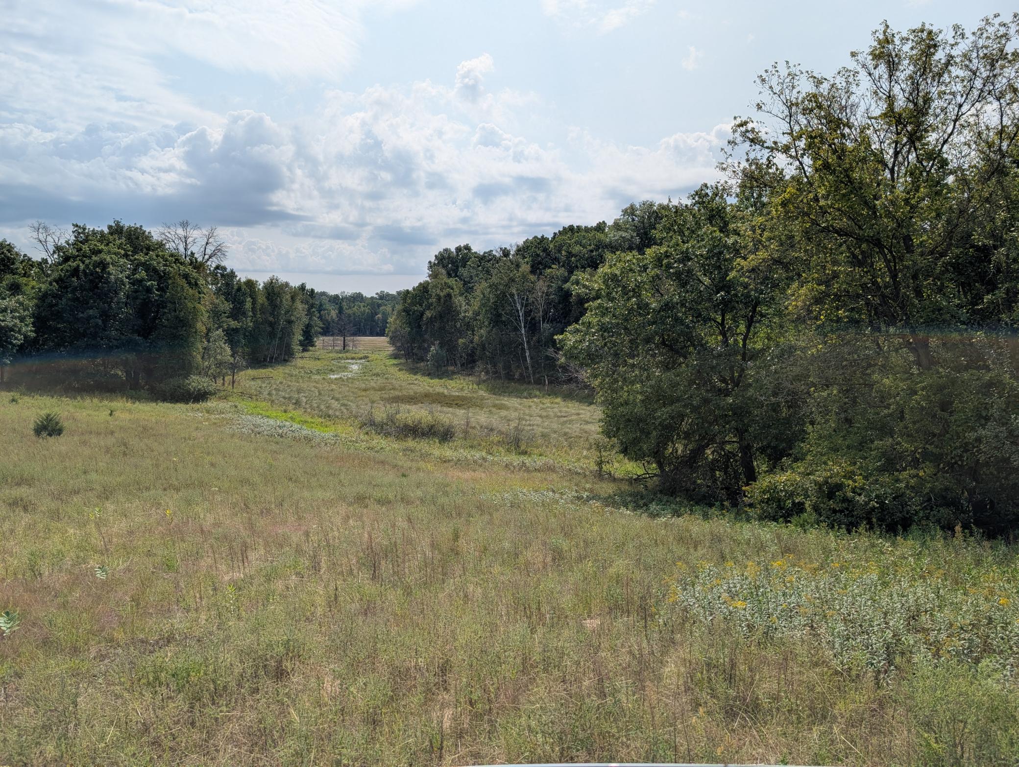 Time to kick back and admire the gently sloping meadow overlooking the wildlife, pond and seasonal wetlands.