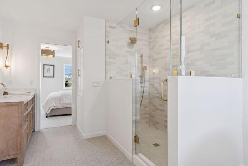 Experience ultimate luxury in this newly renovated ensuite bathroom, featuring a separate walk-in shower and large soaker tub.