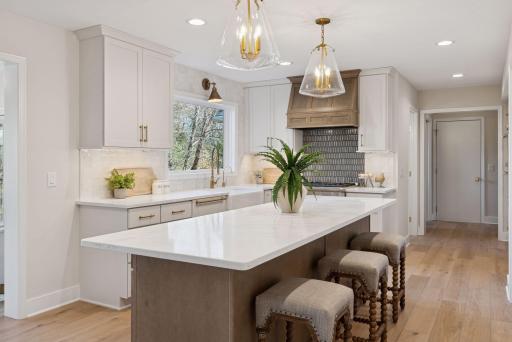 Discover culinary excellence in the chef's kitchen with Scandia cabinetry, quartz countertops, and top-of-the-line Thermador appliances