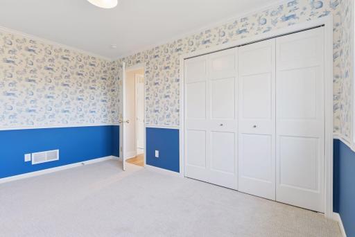 Third bedroom on the upper level with closet space