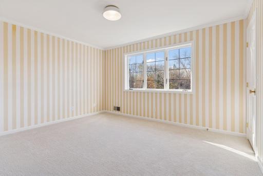 Third bedroom on the upper level with new carpet