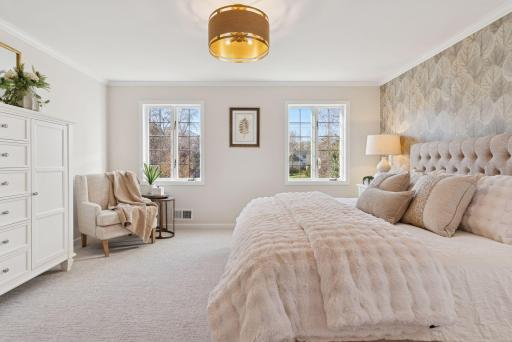 Generous sized primary bedroom with an en-suite full bathroom