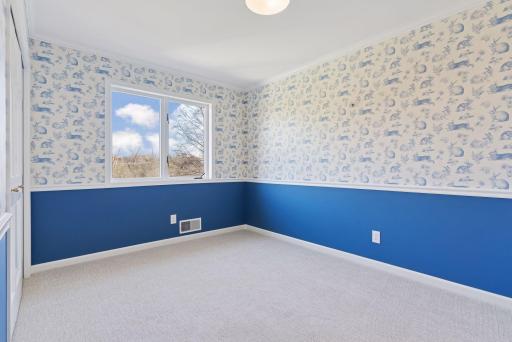 Third bedroom on the upper level with new carpet