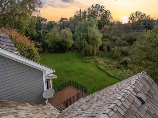 Enjoy breathtaking sunrise views from the back of the house, perfectly positioned to face east