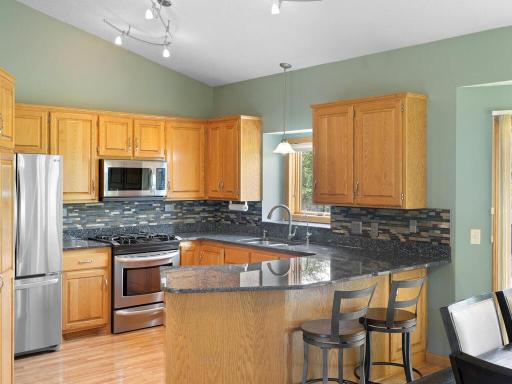 Feel luxury with your Granite Counters and ceramic tile backsplash