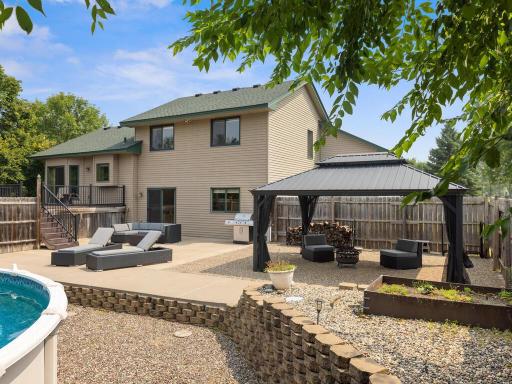 Spacious patio for outdoor dining and summer parties. 26072 159th St NW Big Lake MN 55330 USA-011-038-009-MLS_Size.jpg