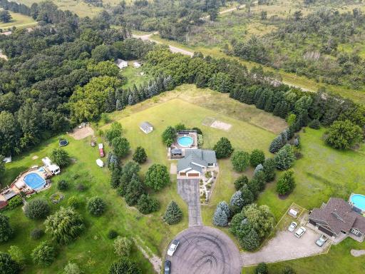 Experience resort-style living on 2.5 private acres!