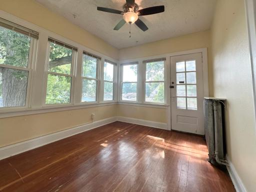 Upper Level Bedroom with access to back staircase and deck
