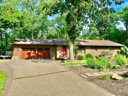 Great curb appeal and an extra gravel parking space beside the garage.