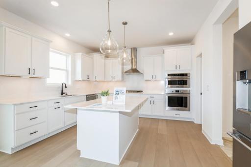 (Photo of a similar home, actual finishes may vary)